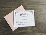 A white card and pale pink envelope lie flat on a wooden floor. The card is a "galentines coupon" with friend catch-up inspired ideas written as suggestions to do at a later date. By Stationare