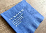 A royal blue cocktail napkin lies at an angle on a wooden floor. It reads, "I'll have a water." with the words "and that right there is when I knew we weren't going to be friends."