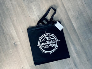 black canvas wanderlust tote by stationare