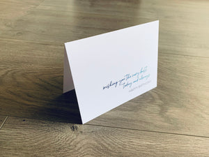 White folded notecard is propped up on a wooden floor. The card reads, "wishing you the very best today and always - happy birthday" in a mix of script and serif fonts. From Stationare's Friendship Birthday collection.
